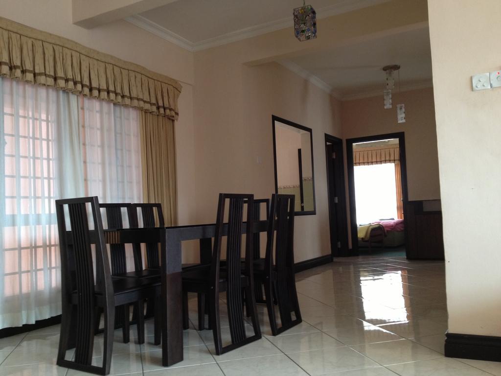 Homestay Marina Court Кота-Кинабалу Экстерьер фото