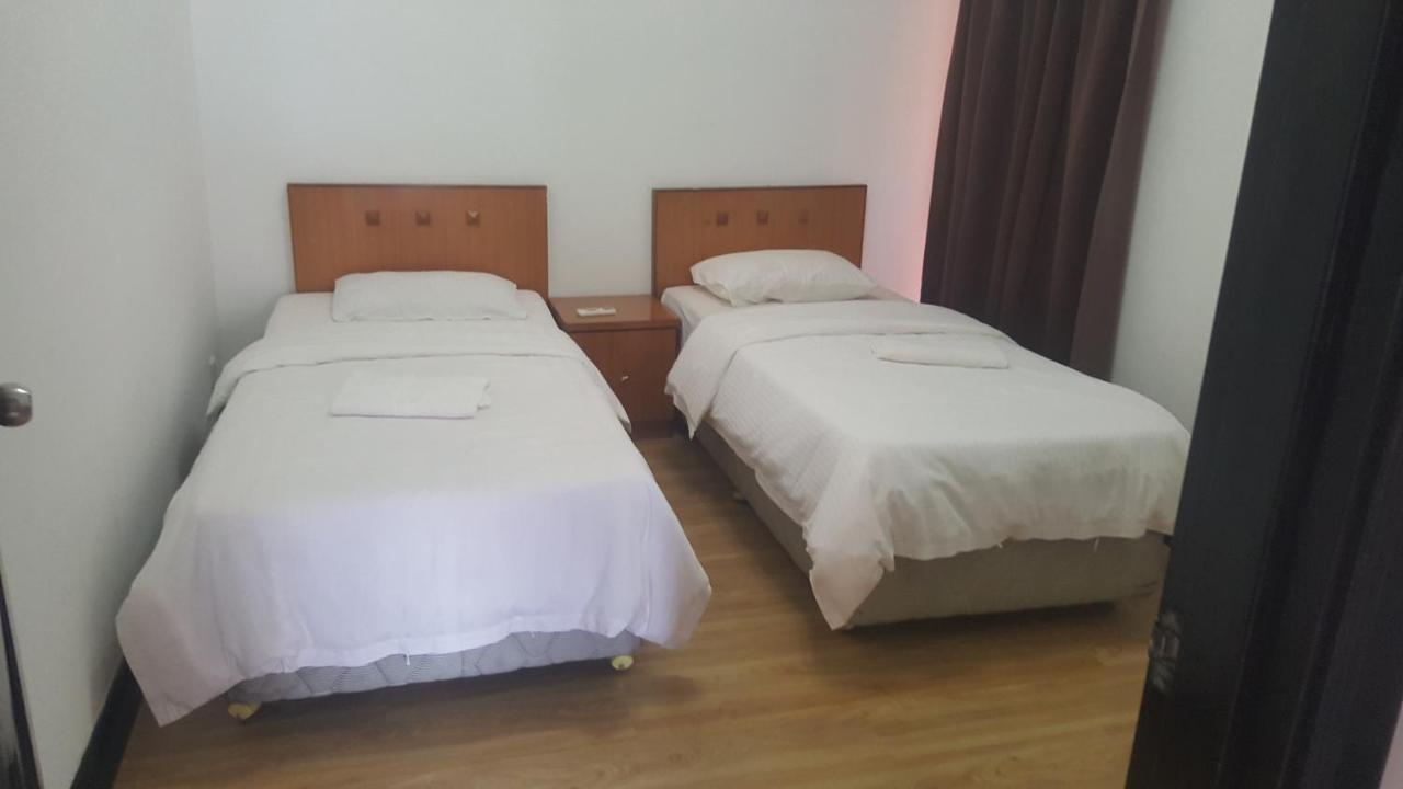 Homestay Marina Court Кота-Кинабалу Экстерьер фото